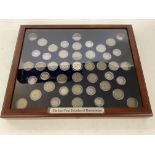 Framed decade of coins