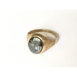 An oval hematite centurion head ring in 9ct gold