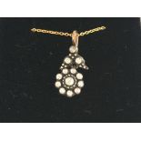 Yellow gold cluster pendant set with rose cut diam