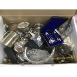 A box containing a collection of silver plate and