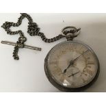 A silver open face key wind pocket watch with a si