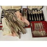A collection of silver and silver plated cutlery s