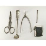 Five small items of silver comprising a vesta case, wishbone shaped sugar nips etc.