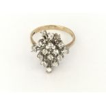 An unusual designed multi stone ring in 9ct gold