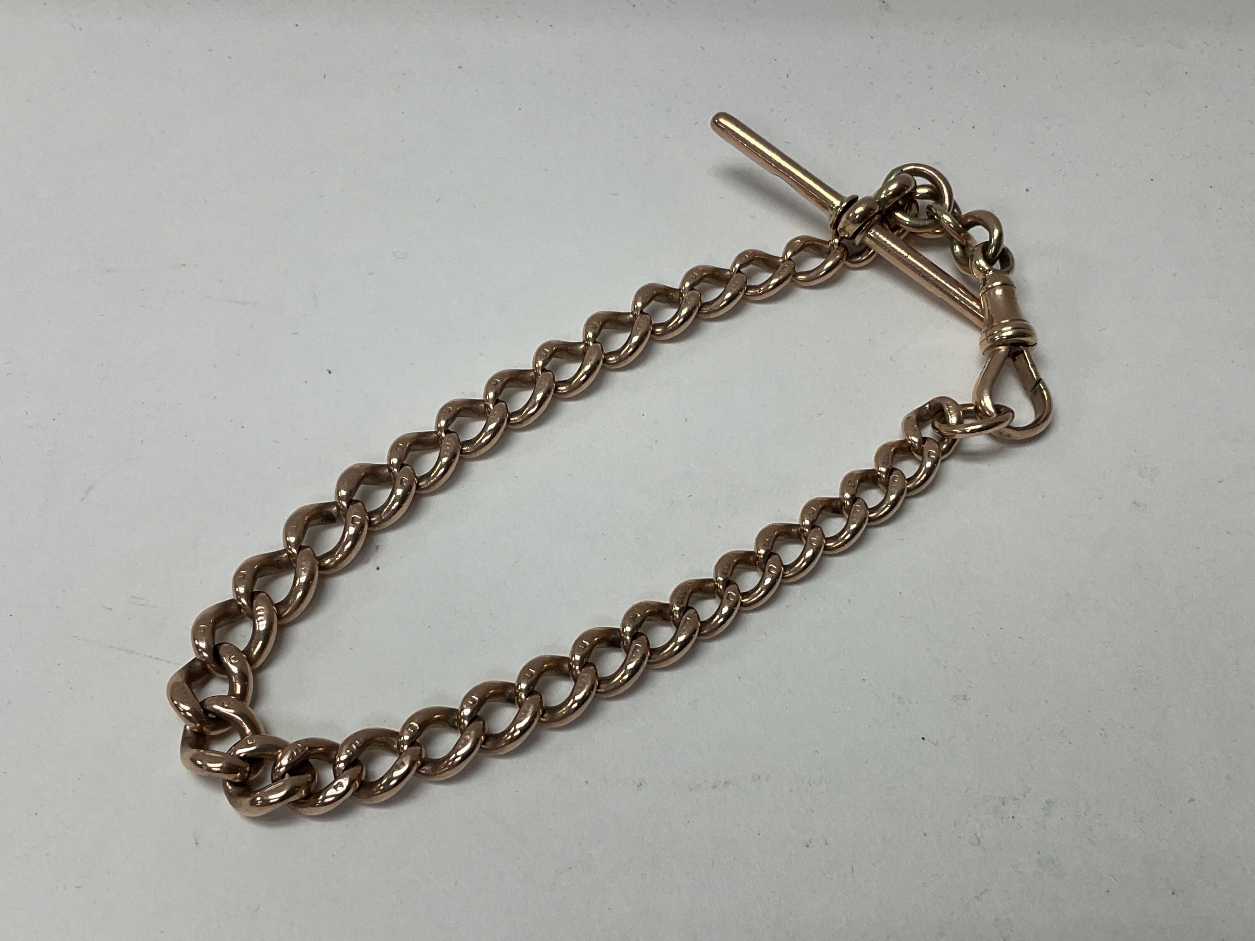 A heavy 9ct gold T bar bracelet. Approx 22.4g.