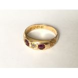 A Victorian ruby and diamond 3 stone ring in 18ct