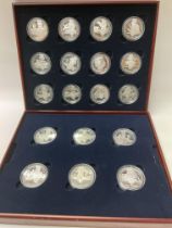 A cased Royal Mint silver proof crown collection.
