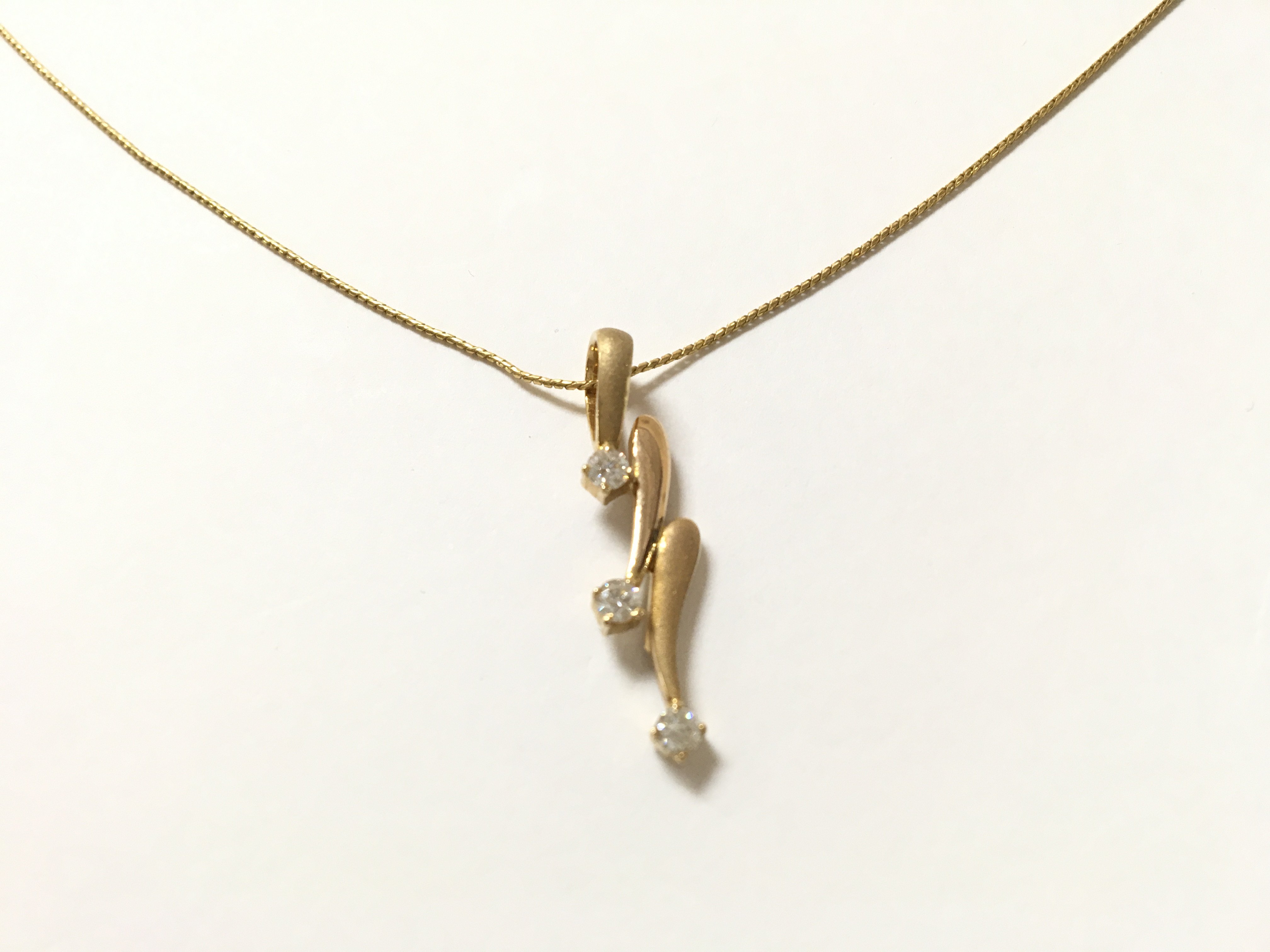 A 22ct gold pendant set with diamonds. Total weigh - Image 2 of 2