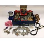 A collection of costume jewellery including a silv
