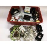 A tray of costume jewellery comprising many silver