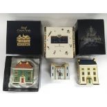 Three boxed Royal Crown Derby paperweights in the