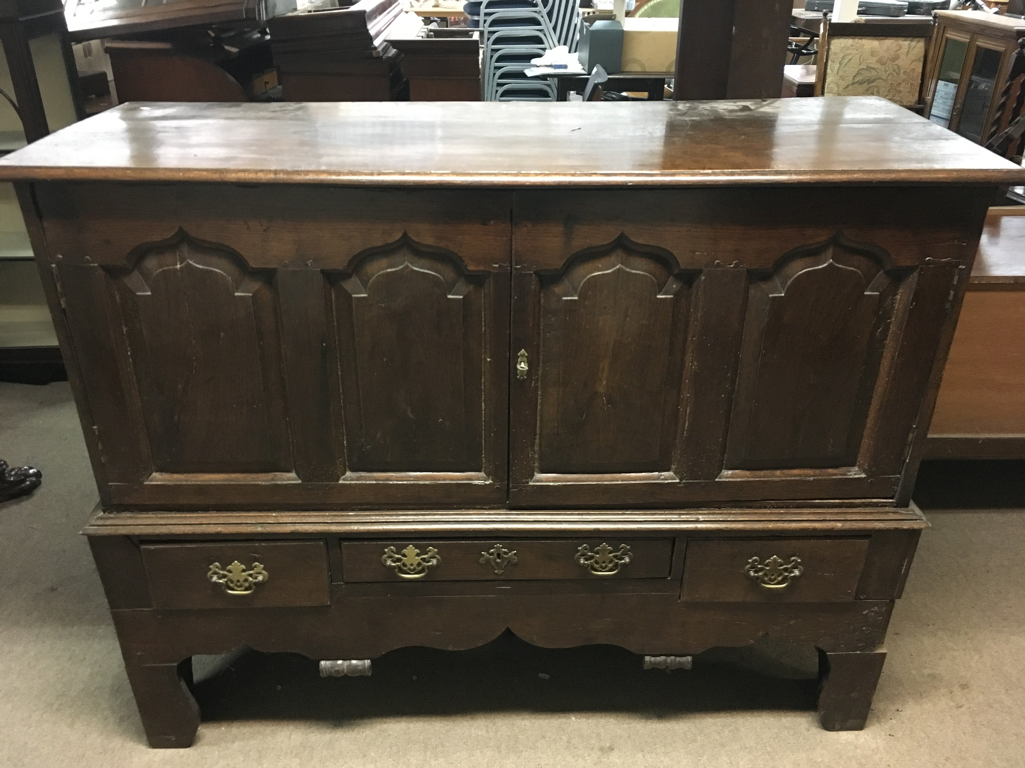 A large early 18th oak cabinet.