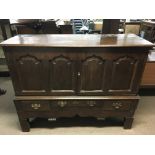 A large early 18th oak cabinet.