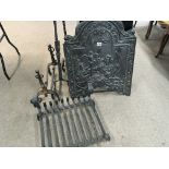 An 18th century cast iron fire back of classical d