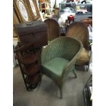 A collection of Lloyd Loom three chairs one with m