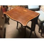 An Edwardian cross banded mahogany Sutherland table. Length 61cm