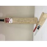 A signed Essex team cricket bat and two miniature