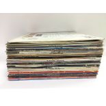 A collection of LPs by various artists including F