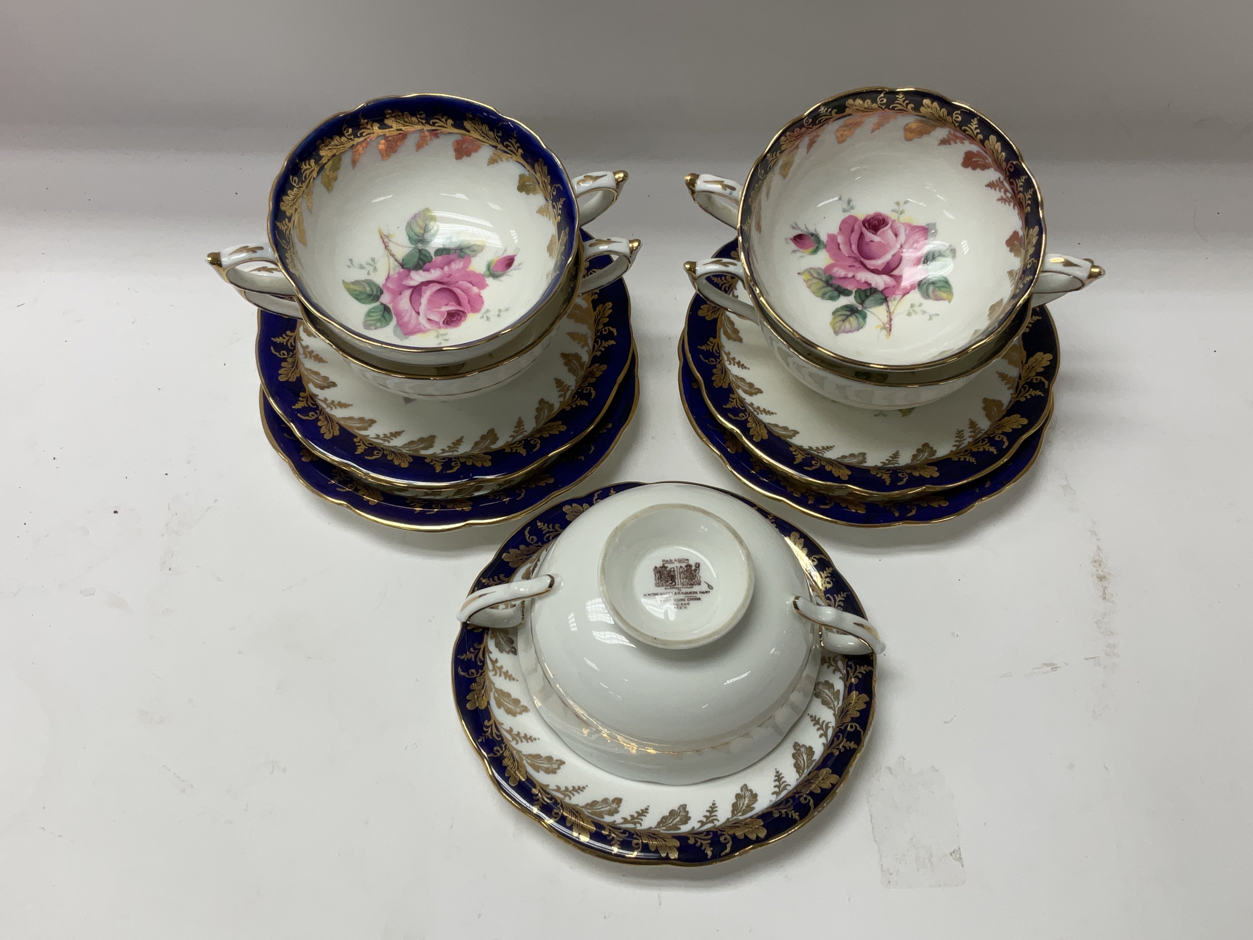 5 Paragon porcelain soup bowls and saucers.