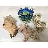 Two Art Deco plaster wall masks an art glass vase