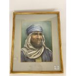 WITHDRAW A large gilt framed pastel portrait of an Arab. 46