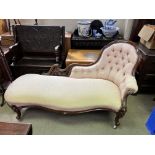 A Victorian upholstered walnut chaise lounge. NO R
