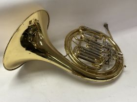 A cased Anborg French Horn.