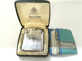 A Ronson varaflame lighter in box.