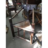 A 19th century wood turners chair with a rectangul