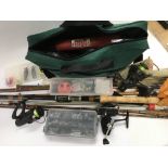 A collection of fishing rods and equipment.