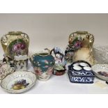 A collection of ceramics including a strawberry di