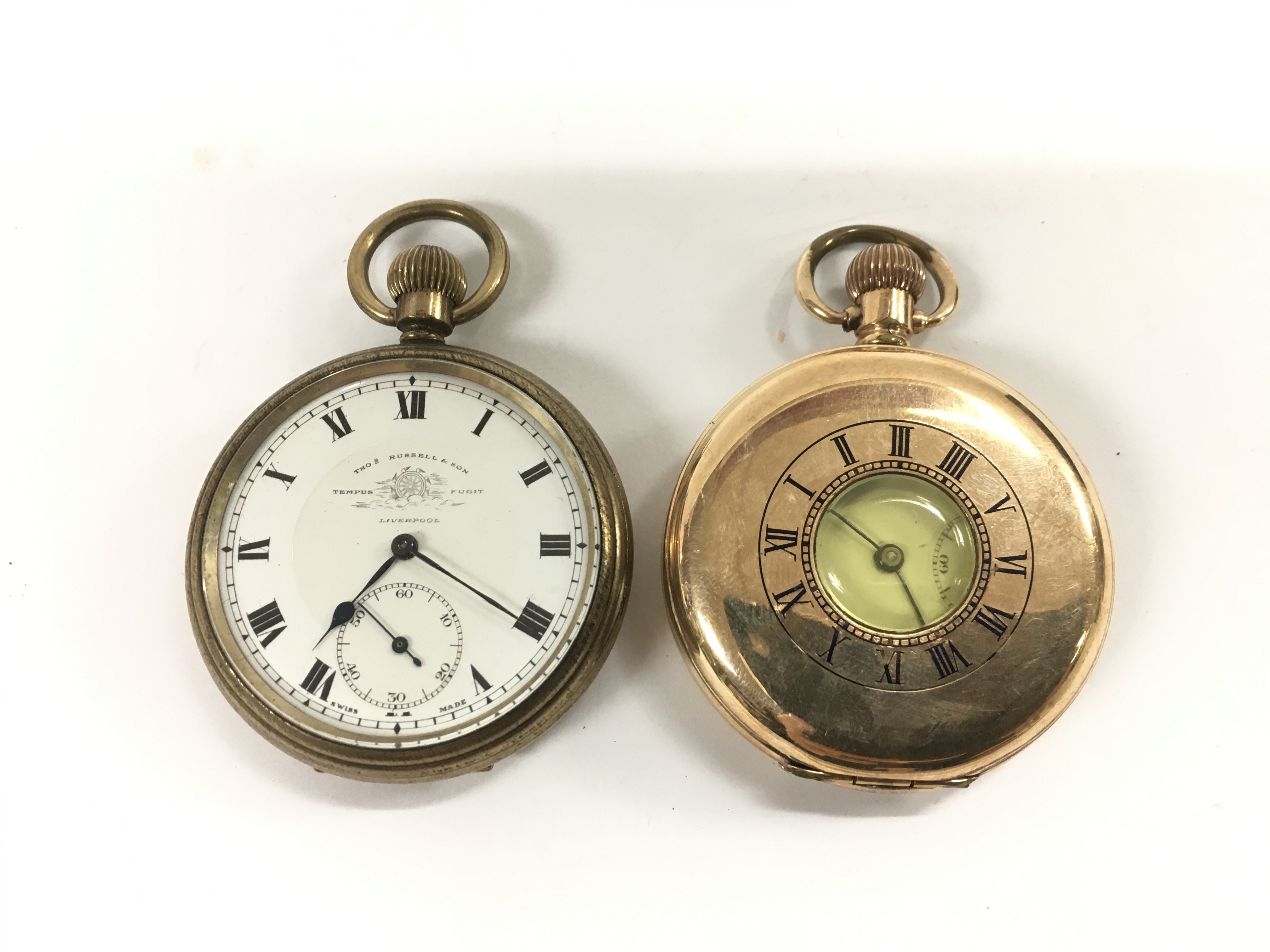Two gold plated pocket watches including a half hunter example and one other.