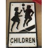 A cast iron sign children crossing. 30 cm 18 cm .