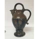 A Victorian Castle Hedingham pottery jug the spout