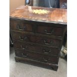 A 20th century small mahogany chest of drawers fit