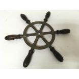 Old brass and wood ships wheel