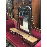 A Victorian dressing mirror with turned and fluted supports No Reserve.