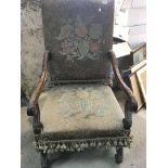 A quality 19th carved walnut open arm chair with s