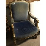 A gilt wood open arm chair the scroll arms with st