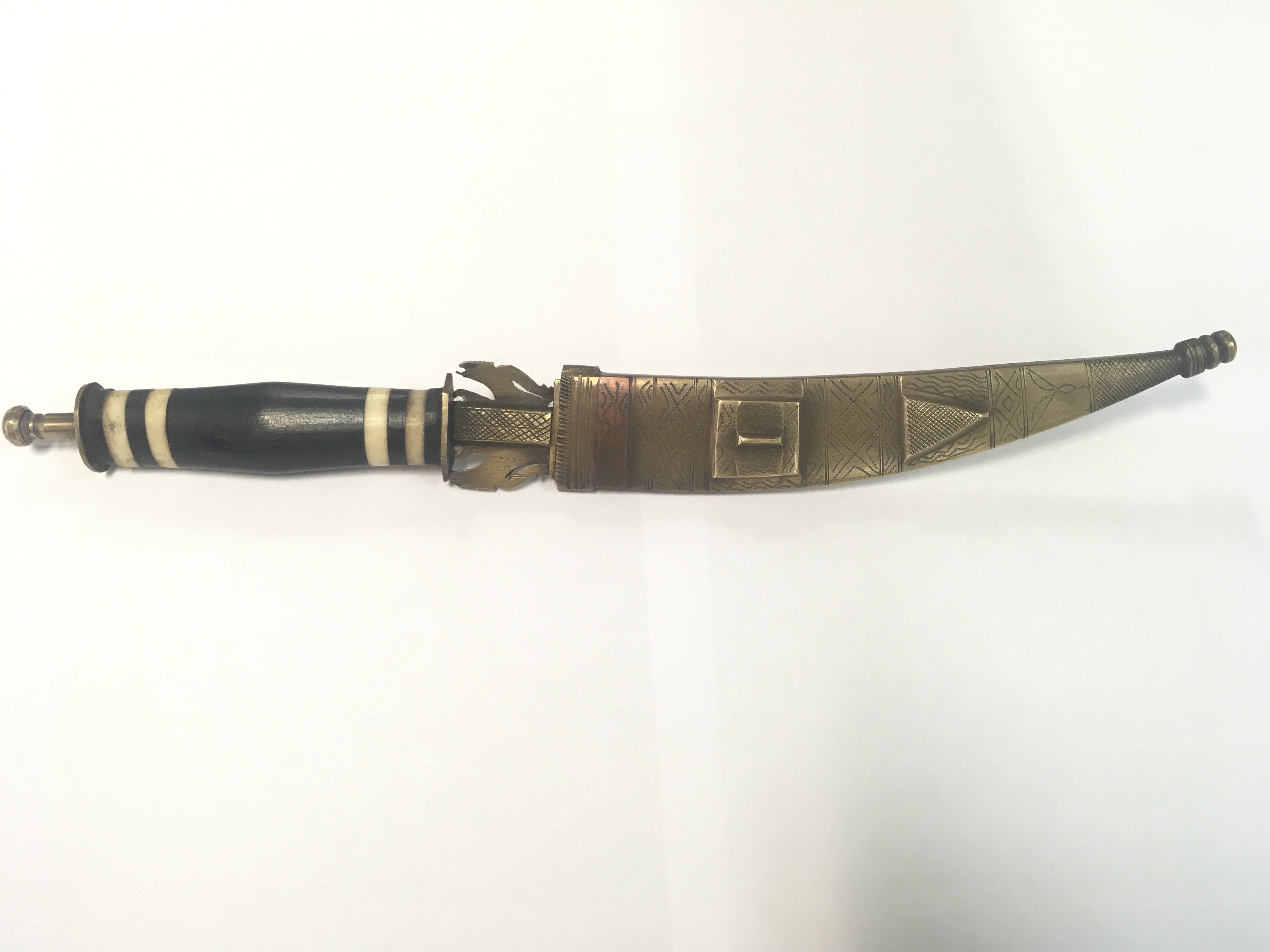 Unusual antique knife in brass scabbard with a woo