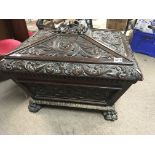 A Quality Victorian carved oak wine cooler. Profus