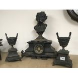 A Victorian black slate and bronze clock garniture