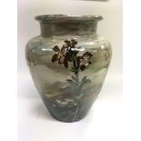A French pottery vase painted with flowers, approx