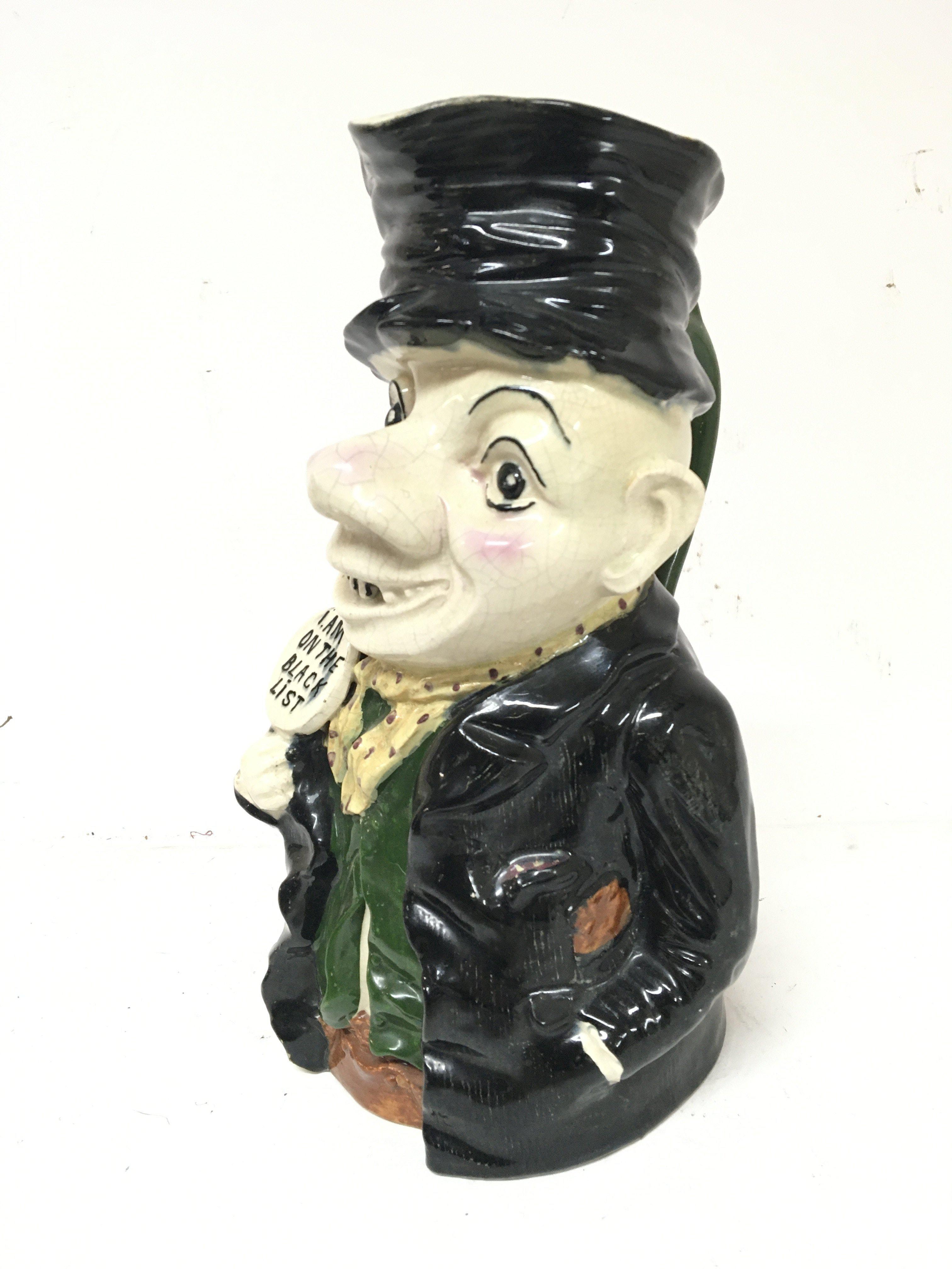 A ceramic early 20th century caricature jug .â€™ I