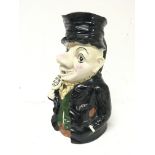 A ceramic early 20th century caricature jug .â€™ I