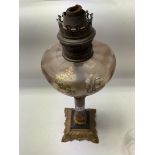 A Victorian Brennan Oil lamp with polished stone c