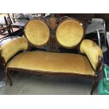 An Edwardian lounge suite comprising two seater so