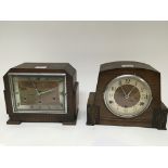 Two oak mantel clocks with three train movements a