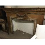 A Quality early 19th century pine fire surround wi