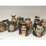 A collection of large Royal Doulton character jugs